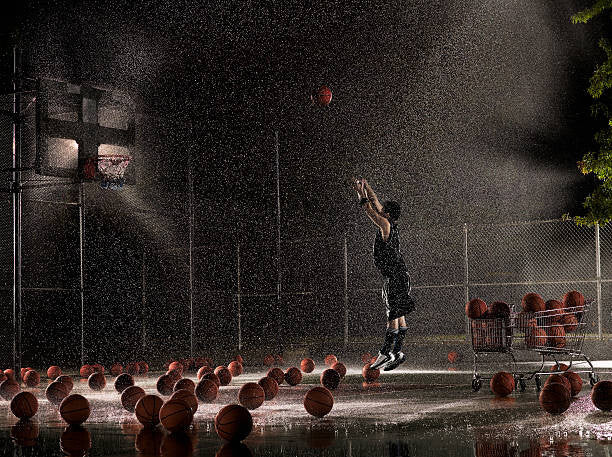 Leinwand Poster, Bilder Man shooting basketball at night in, Adam Weiss, 80 × 60 cm