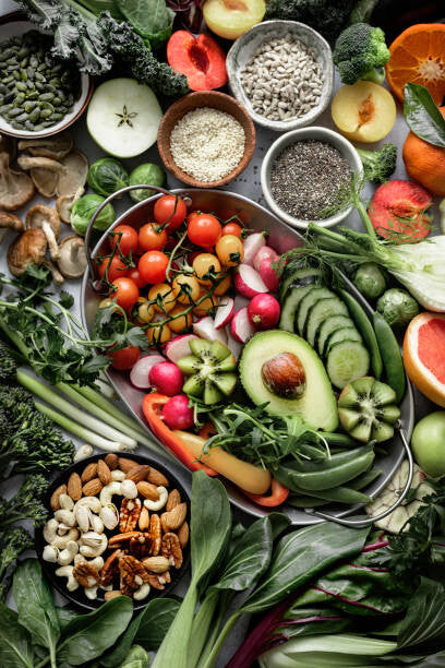 Leinwand Poster, Bilder Fresh vegetables with mixed nuts flat, Florentin Catargiu / 500px, 60 × 90 cm